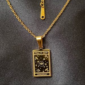 Judgement pendant necklace